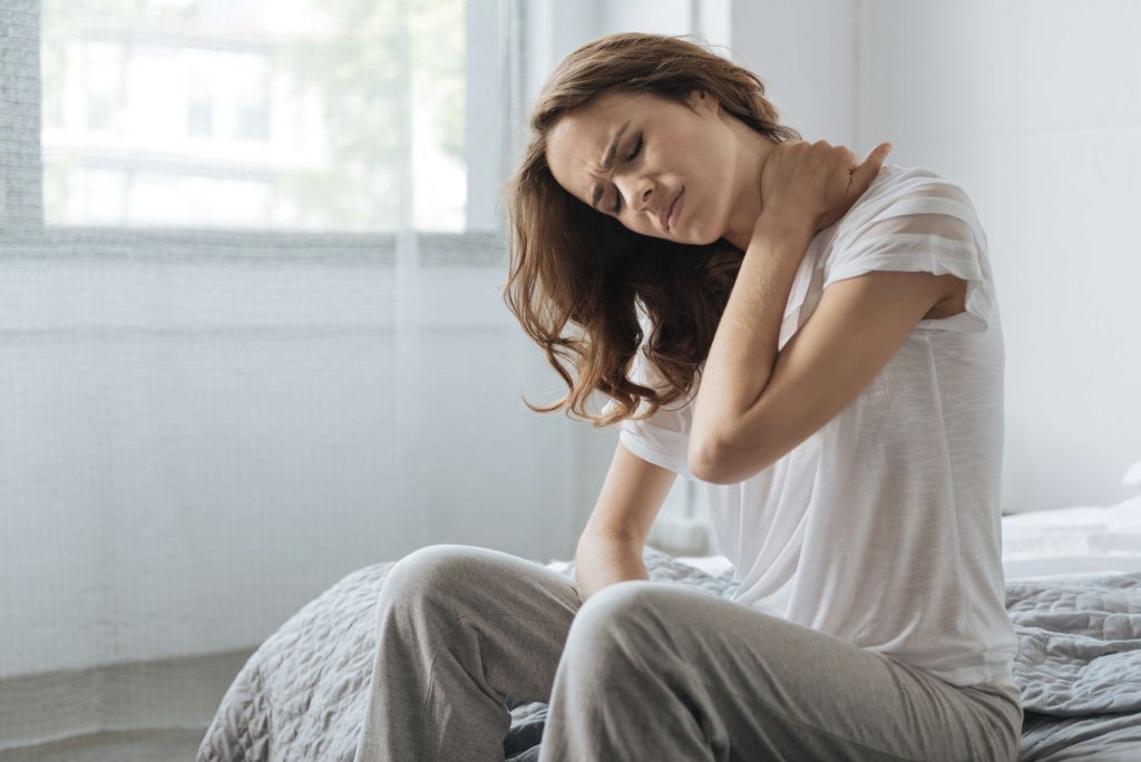 How to get rid of neck pain from sleeping wrong shutterstock 692073487 how to get rid of neck pain from sleeping wrong