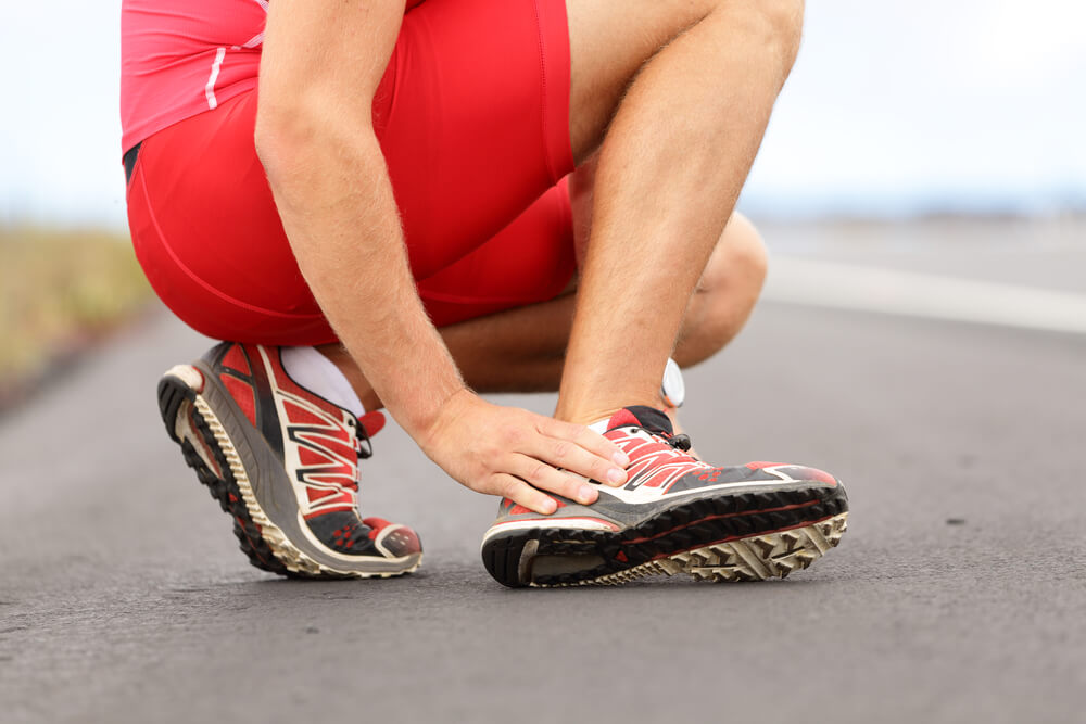 Why do I have a stabbing pain in the side of my foot? shutterstock 110884610 stabbing pain in foot side