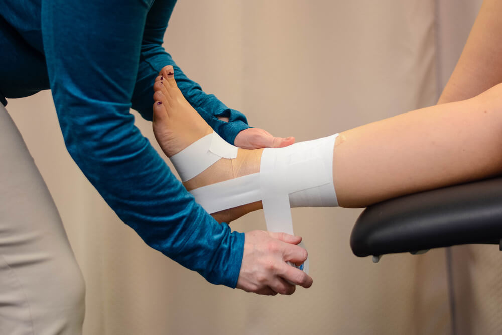 When can I go back to work after an ankle sprain? shutterstock 1430770904 foot and ankle pain when walking | ankle pain | continuum wellness