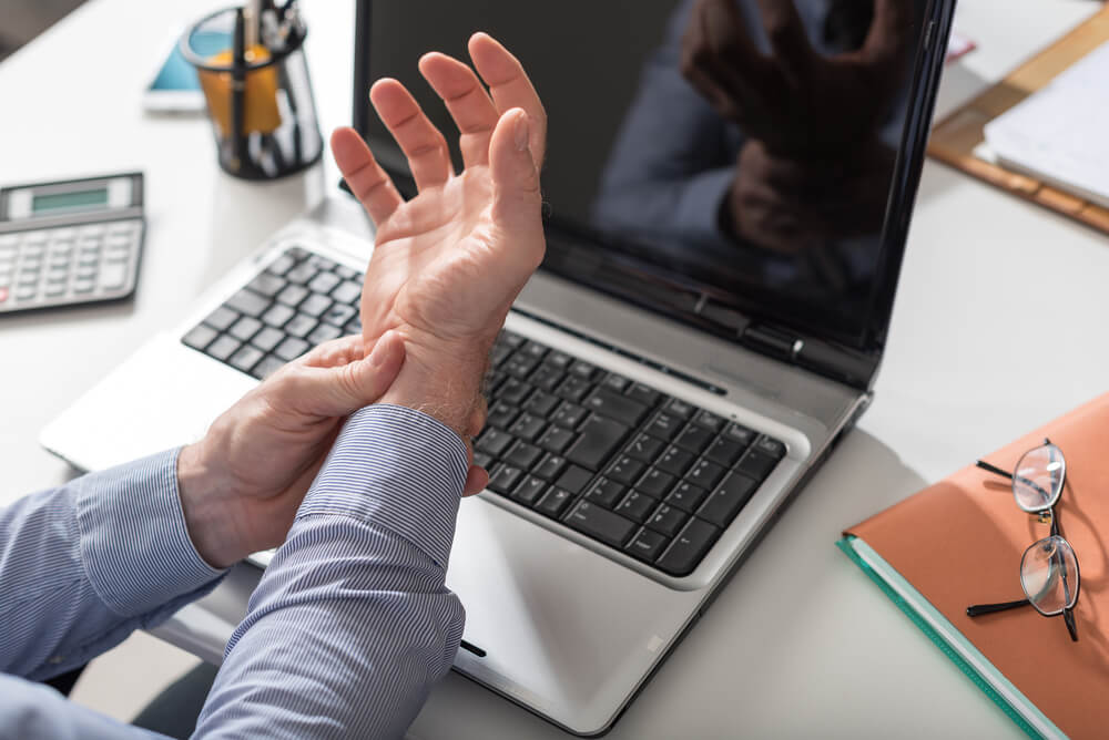 How can physical therapists help treat carpal instability?