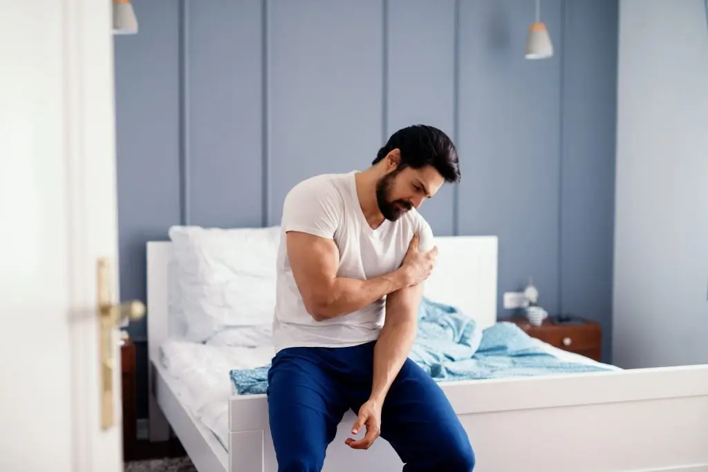 Why Does My Shoulder Hurt After Sleeping on Side? AdobeStock 178682503 why does my shoulder hurt after sleeping on side? shoulder pain